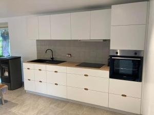 Kuchyň nebo kuchyňský kout v ubytování De Skure: vakantiewoning op boerderij
