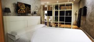 Cama o camas de una habitación en ALMAALQUILER Clavería 11