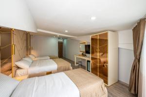 Cama ou camas em um quarto em Luxury Airport Hotel By Zazzoni-İstanbul Airport