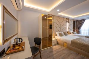 Cama ou camas em um quarto em Luxury Airport Hotel By Zazzoni-İstanbul Airport