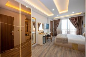 Cama ou camas em um quarto em Luxury Airport Hotel By Zazzoni-İstanbul Airport