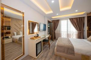Cama ou camas em um quarto em Luxury Airport Hotel By Zazzoni-İstanbul Airport