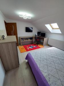 Μια τηλεόραση ή/και κέντρο ψυχαγωγίας στο Cozy and modern house