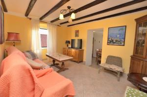 TV a/nebo společenská místnost v ubytování Apartment Stari Grad