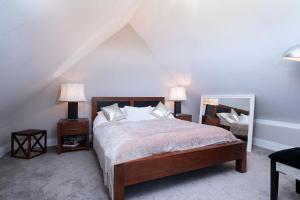 Postel nebo postele na pokoji v ubytování Cottage 424 - Cashel