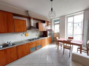 Kuchyňa alebo kuchynka v ubytovaní Casa Turati - 10 min da Porta Nuova & Inalpi Arena