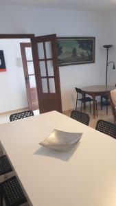 a white table with a napkin on top of it at Casa Lavanderas in Algodonales