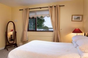 Voodi või voodid majutusasutuse Cottage 431 - Oughterard toas