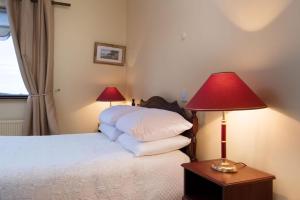 Voodi või voodid majutusasutuse Cottage 431 - Oughterard toas