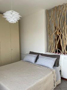 Een bed of bedden in een kamer bij Apartment "La Balotta"