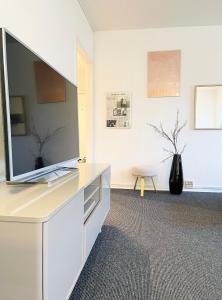 TV a/nebo společenská místnost v ubytování Randers residence Sankt Andreas - 2 room apartment