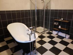 a bathroom with a sink and a shower at Springmount Vacation 