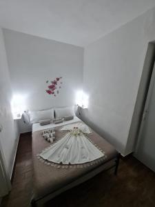Postel nebo postele na pokoji v ubytování Curti Granda