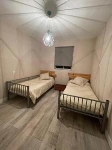 Katil atau katil-katil dalam bilik di Pureza del Hueznar
