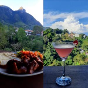 a drink and a plate of food with a view of a mountain at Jaibaná Spa in Támesis