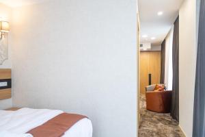 Letto o letti in una camera di Hotel Solum Roof Top
