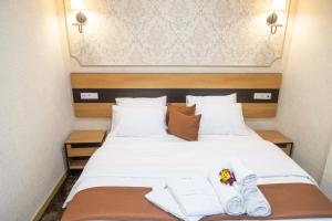Letto o letti in una camera di Hotel Solum Roof Top