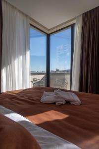 Letto o letti in una camera di Hotel Solum Roof Top