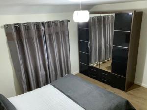 Katil atau katil-katil dalam bilik di Ideal Abode Greenfields