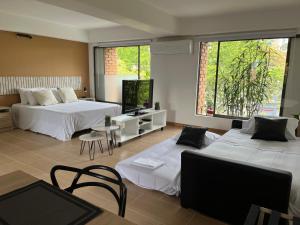 Voodi või voodid majutusasutuse Poblado Park Apartamento-Estudio toas