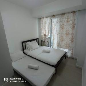 Cama o camas de una habitación en Azure urban resort maui tower