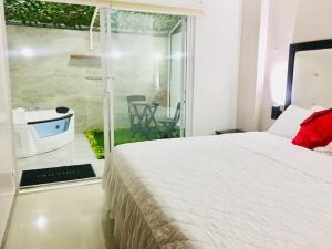 Postel nebo postele na pokoji v ubytování Casa Gaviota Dorada
