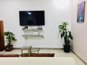 TV a/nebo společenská místnost v ubytování Casa Gaviota Dorada