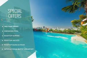 een bord voor een hotel met een zwembad bij Alagon City Hotel & Spa in Ho Chi Minh-stad