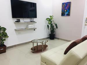 TV a/nebo společenská místnost v ubytování Casa Gaviota Dorada