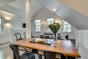 a dining room with a table and chairs at Old Town Chicago at it's finest! Pet Friendly & Recently Renovated Top-Floor Condo Has Everything You Need for a Perfect Windy City Getaway condo in Chicago +11 photos