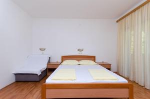 Posteľ alebo postele v izbe v ubytovaní Apartments Josip S