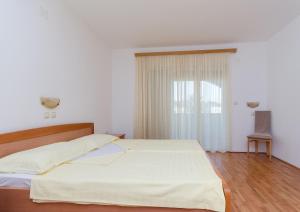 Posteľ alebo postele v izbe v ubytovaní Apartments Josip S