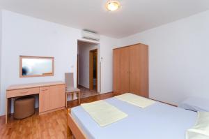 Posteľ alebo postele v izbe v ubytovaní Apartments Josip S
