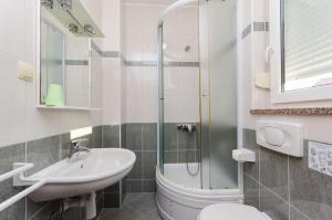 Kúpeľňa v ubytovaní Apartments Josip S