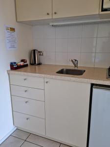 Kuchyň nebo kuchyňský kout v ubytování Methven Motel & Apartments