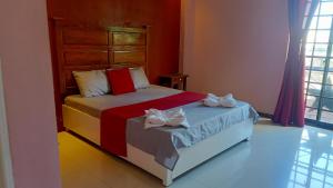 Postel nebo postele na pokoji v ubytování Answer hotel