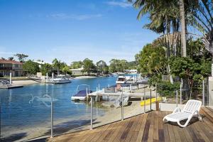 a view of a marina from the deck of a house at 15 Mossman Court Noosa Sound in Noosa Heads
