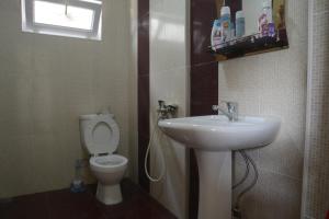 Koupelna v ubytování Guest House Lviv Грузия