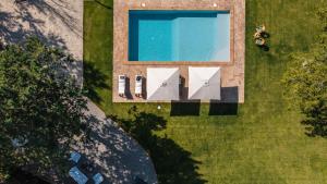 A garden outside CASALE TAVERNELLE 6, Emma Villas