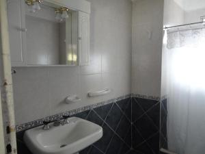 Koupelna v ubytování Valle De Las Sierras Hotel + 24 fotografií