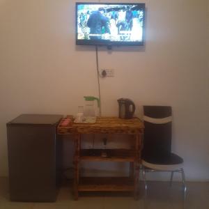 TV a/nebo společenská místnost v ubytování Sunshinevibe guest house