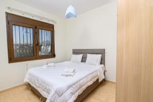 Posteľ alebo postele v izbe v ubytovaní 4 Seasons Home