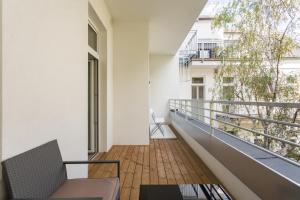 A balcony or terrace at Luxury / special for families/ Vienna town hall
