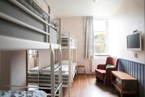Postel nebo postele na pokoji v ubytování Kvibergs Vandrarhem - Hostel