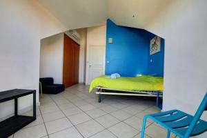Postel nebo postele na pokoji v ubytování Le Corossol - T3 la Saline les Bains