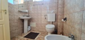 Een badkamer bij Vila Europa