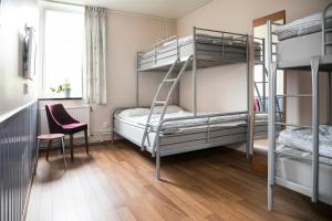Postel nebo postele na pokoji v ubytování Kvibergs Vandrarhem - Hostel