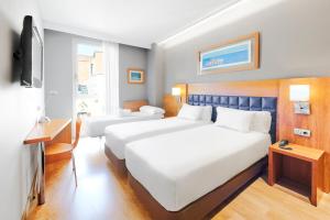 Posteľ alebo postele v izbe v ubytovaní Barcelona Century Hotel