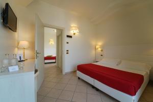 Postel nebo postele na pokoji v ubytování Hotel Imperial Beach - Dada Hotels