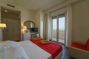 Postel nebo postele na pokoji v ubytování Hotel Imperial Beach - Dada Hotels